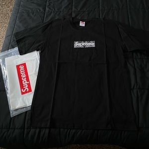 Supreme with stickers and bag